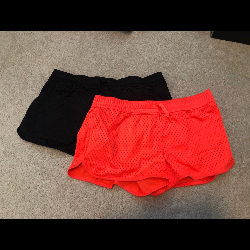 2 pack athletic shorts. Black and orange. NWOT